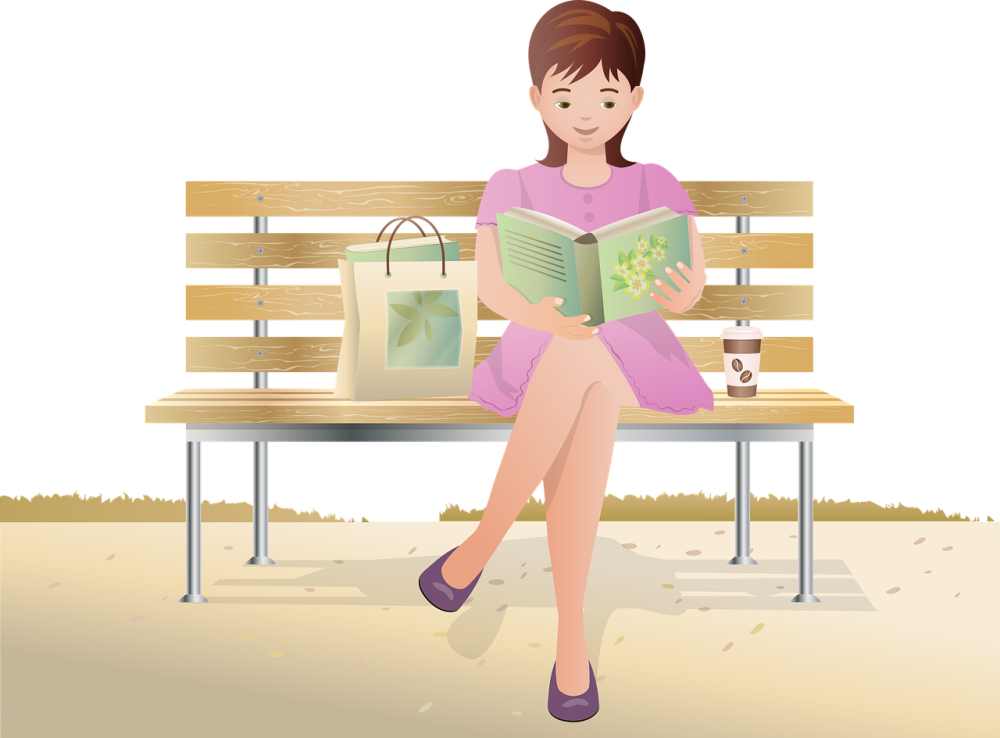 Kobieta czyta książke, siedząc na ławce.