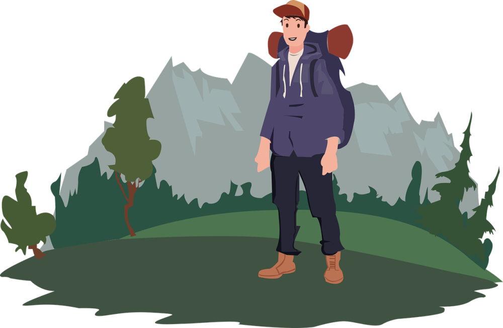 Męzczyzna z plecakiem w plenerze górskim.